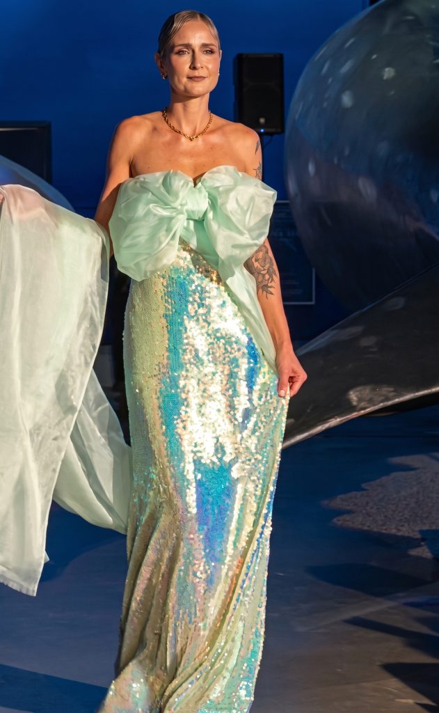 Model in Teal Iridescent Gown with Bow